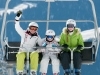 Ski lift - happy skiers on ski  vacation